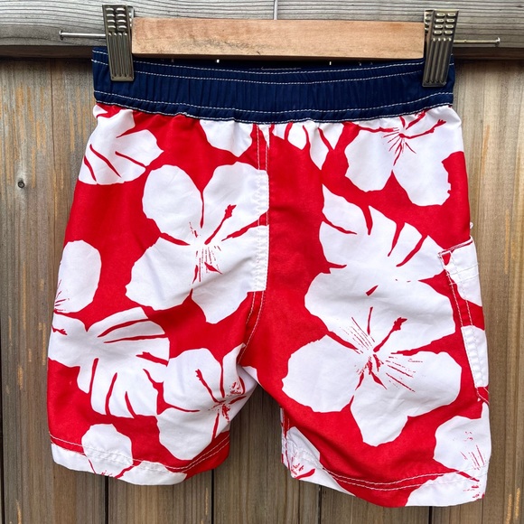 FINAL PRICE: HANNA ANDERSSON Red Swim Shorts with White Hawaiian Flower Design - Picture 2 of 3